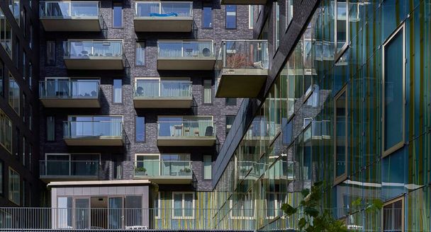 Shot of an apartment building with glass balconies in Gershwinlaan Zuidas, Amsterdam - Fotografie, Obrázek