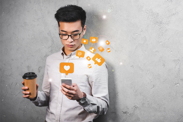 asian seo manager holding paper cup, using smartphone with likes illustration   - Photo, Image