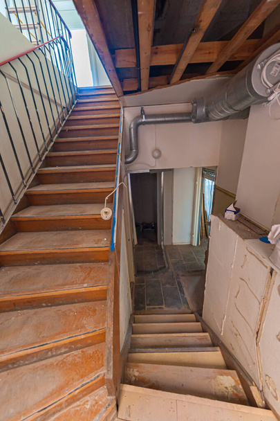 Stairs in an office during renovation. - 写真・画像