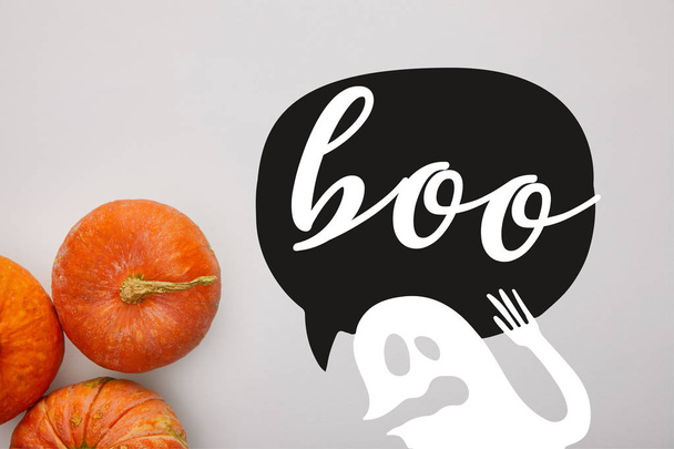 top view of pumpkin on white background with boo and ghost illustration, Halloween decoration - Foto, Imagem