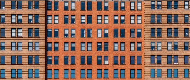 Banner and cover scene of Brown Brick high building facade with windows in New York City, United states of America, USA, Industrial Background and texture, Loft inspiration. Construction facade,  - Foto, afbeelding
