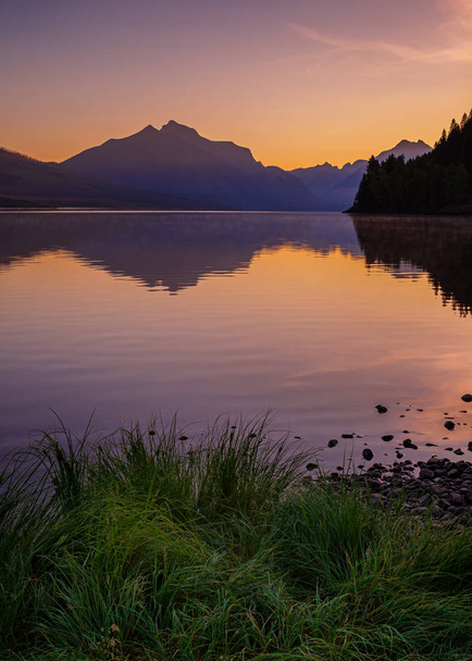 Lake Macdonald in Glacier National Park at sunrise - Photo, Image