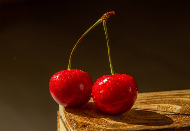 Delicious sweet ripe and juicy sweet cherry berries. - Photo, Image