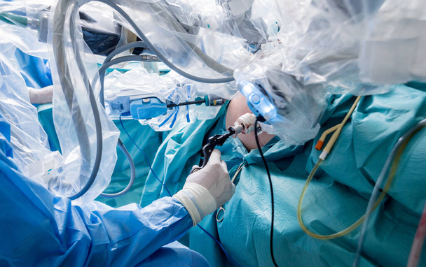 Modern surgical system. Medical robot. Minimally invasive robotic surgery. Medical background - 写真・画像