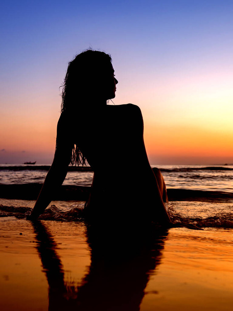 Woman in swiming suit posing on the beach - Фото, зображення