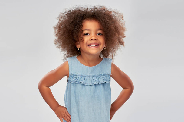 happy little african american girl over grey - Fotó, kép