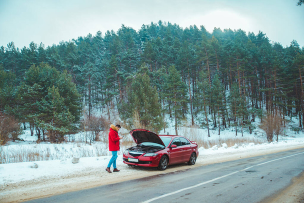 man standing near broken car at roadside snowed winter weather - Photo, Image