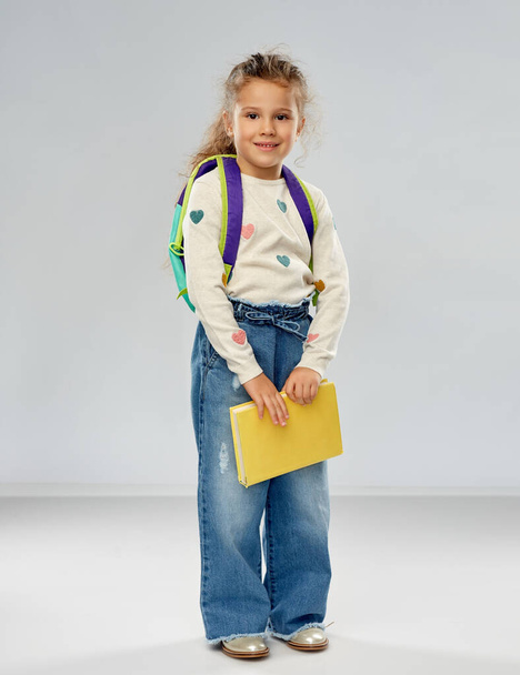 happy little girl with school backpack - Foto, Imagen
