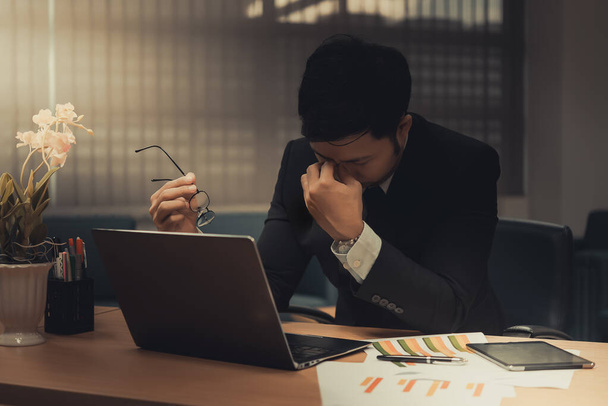 Asian businessman stressed from work,Furious from hard work,Boss complain about project,Thailand people,Young man stressful,Clerk fail from job - 写真・画像