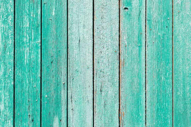 Stará a loupající se barva Postupem času se zelená barva odloupla od starých prken a dřevěná textura praskla. Ročník Abstraktní Grunge pozadí - Fotografie, Obrázek