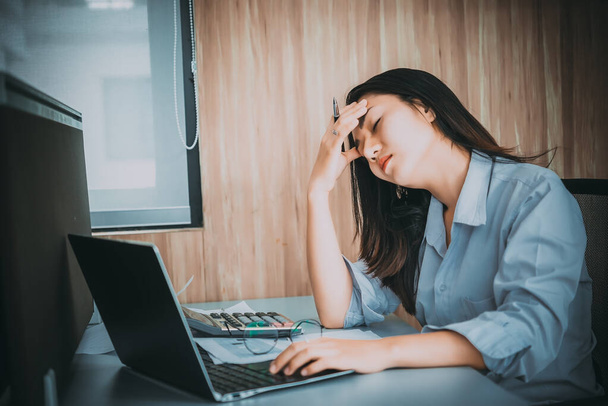 young business woman stressed from work overload while working in office - Φωτογραφία, εικόνα