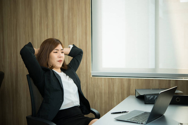 young business woman stressed from work overload while working in office - Foto, Imagen