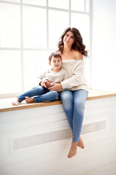 Woman with son at jeans - Foto, Imagem