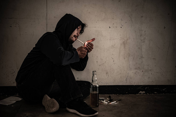 Asian men are drug addicts to inject heroin into their veins themselves.Flakka drug or zombie drug is dangerous life-threatening,Thailand no to drug concept,The bad guy drugs in the desolate - Foto, Bild