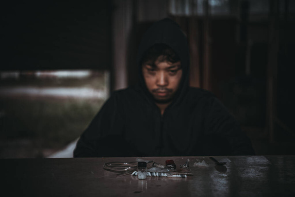 Asian men are drug addicts to inject heroin into their veins themselves.Flakka drug or zombie drug is dangerous life-threatening,Thailand no to drug concept - 写真・画像