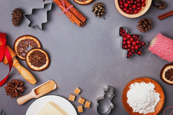 Ingredients for Christmas baking. Flour, brown sugar and spices. - Foto, afbeelding
