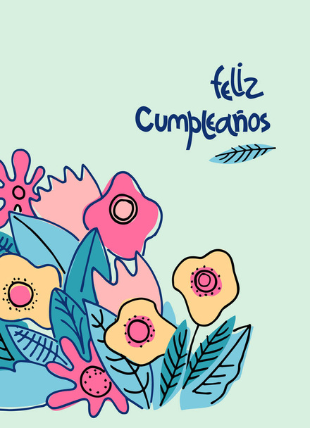 Birthday greeting card in Spanish. Text says Happy Birthday. Hand lettering with floral decoration on blue background - Vector, Image