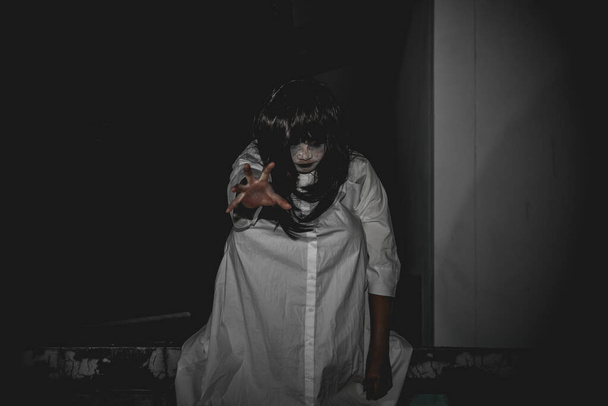 Portrait of asian woman make up ghost face,Horror scene,Scary background,Halloween poster - Fotó, kép