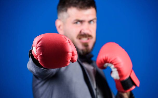 powerful man boxer ready for corporate battle. businessman in formal suit and bow tie. Business and sport success. bearded man in boxing gloves punching. knockout and energy. Fight. Great progress - Foto, Imagem
