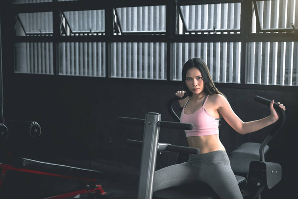 Beautiful asian woman exercising in the gym,Thailand  - 写真・画像