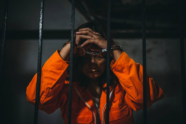 Portrait of women desperate to catch the iron prison, prisoner concept - Foto, Bild