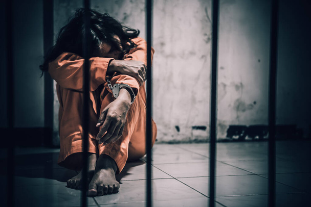 Portrait of woman desperate to catch the iron prison, prisoner concept - Фото, зображення