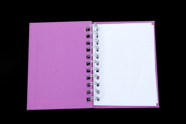 Cuaderno púrpura abierto
 - Foto, Imagen