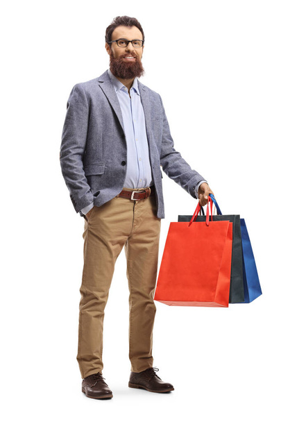 Bearded man holding shopping bags - Photo, image