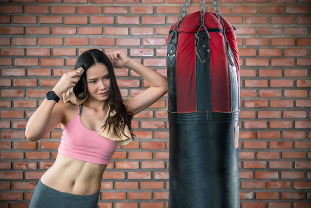 Portrait of asian woman training at the gym  - Photo, image