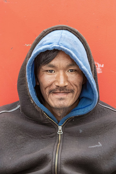 Portrait of an Inuit - eskimo local man looking camera in Nuuk. outdoors. - Valokuva, kuva