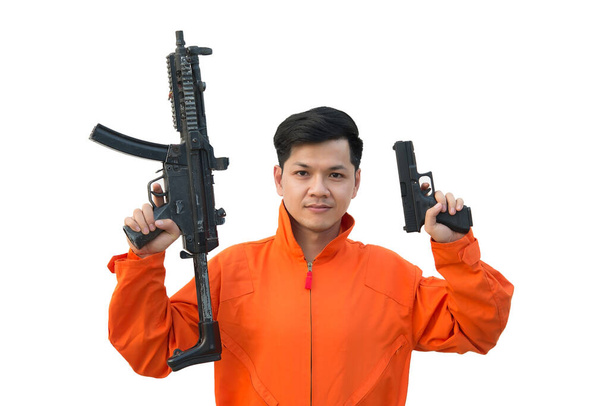 Bandit with gun in hand on white background,Thailand people,Prisoner concept - Foto, imagen