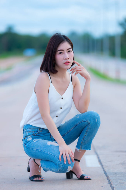 Portrait of beautiful asian woman gold hair outdoor,Happy woman concept,Lifestyle of modern girl,Thailand people - Foto, imagen