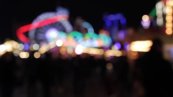 disco lights luna park luna park bokeh ride background synthwave retrowave rainbow bokeh lights rides moving lampeggiante people at night stock, footage, video, clip
 - Filmati, video