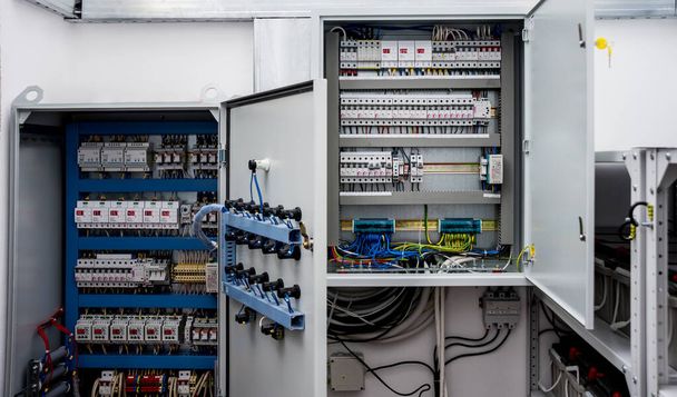 Voltage switchboard with circuit breakers, electrical background - Foto, Imagen