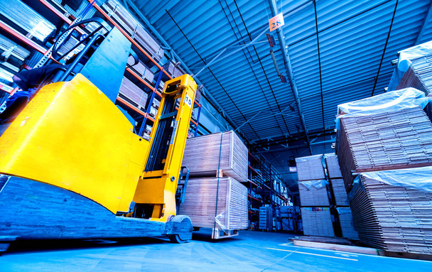 Forklift loader in storage warehouse ship yard, delivery and logistics concept - Fotoğraf, Görsel