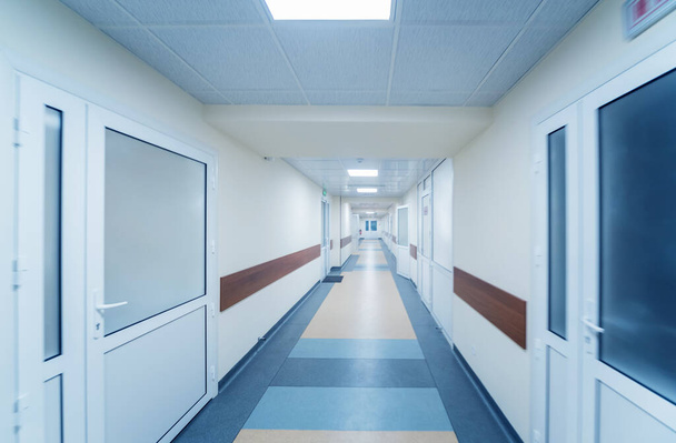 Empty long corridor in the modern clinic, medical background - Zdjęcie, obraz