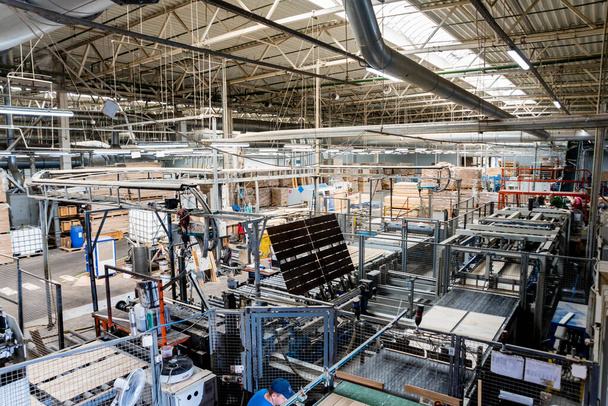 Production line of wooden floor factory, CNC automatic woodworking machine - Fotografie, Obrázek