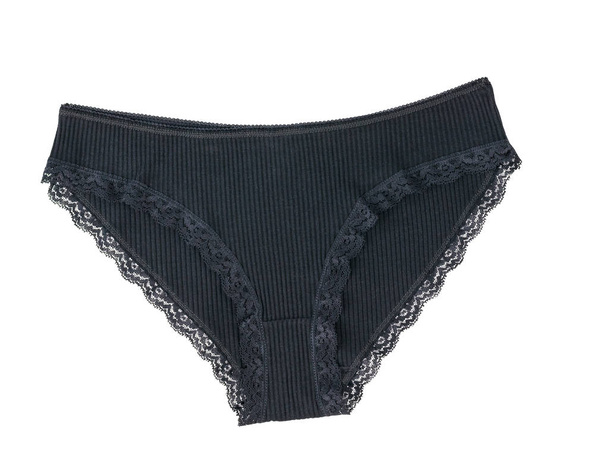 Beautiful fashionable black women's briefs isolated on white background. - 写真・画像