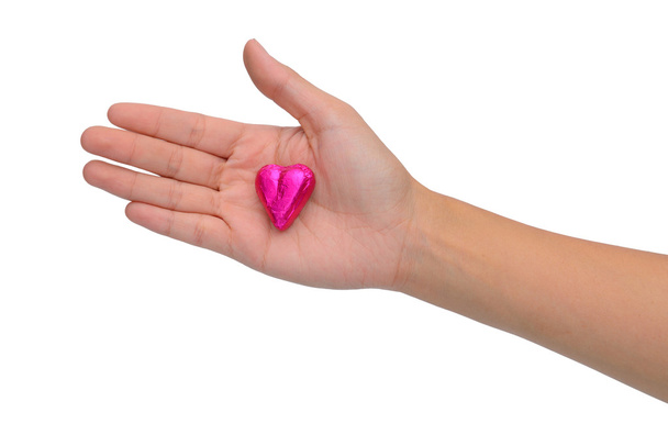 heart chocolate on woman hand - Fotó, kép