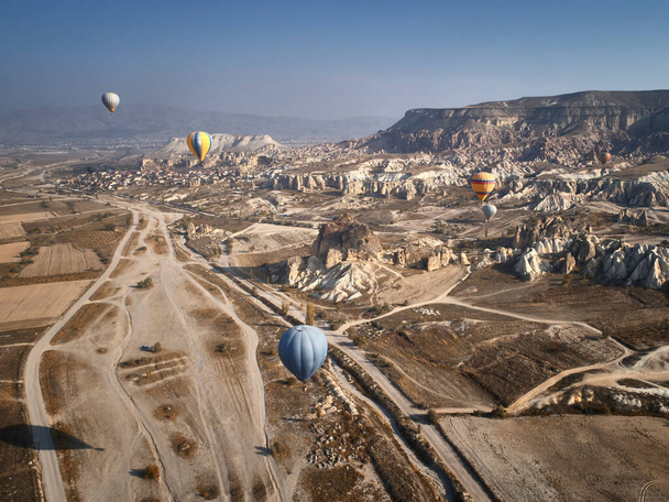 Colorful hot air balloons in the sunny autumn morning. Goreme National Park, Cappadocia, Turkey. - 写真・画像
