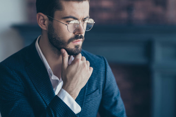 Cropped close-up portrait of his he nice attractive serious imposing bearded guy ceo boss chief deciding making solution solving problem at modern industrial loft interior work place station - 写真・画像