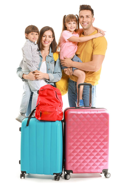 Happy family with suitcases isolated on white - Photo, Image