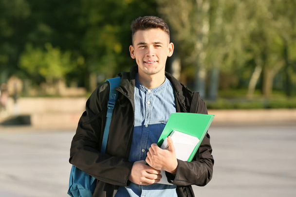 Portrait of teenage male student outdoors - Photo, Image