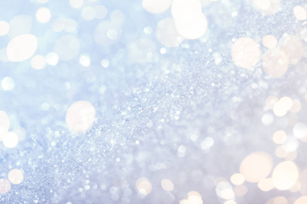Chritmas light background with snow and gold lights - Foto, imagen
