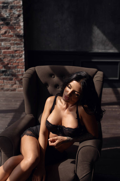 Sexy brunette in black lingerie  - Фото, изображение
