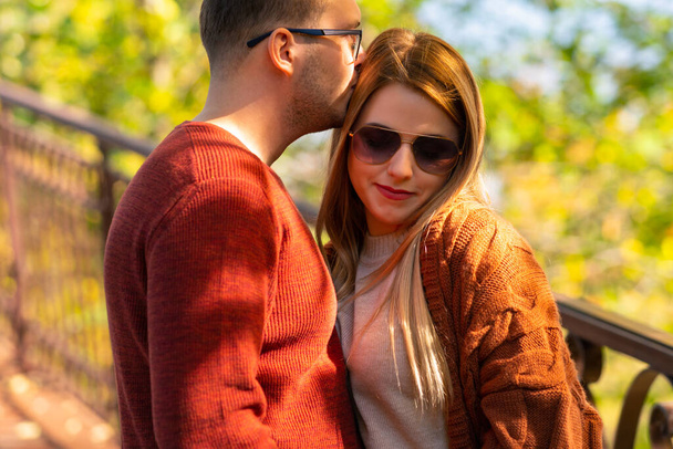 Affectionate young man kissing his girlfriend - Fotografie, Obrázek