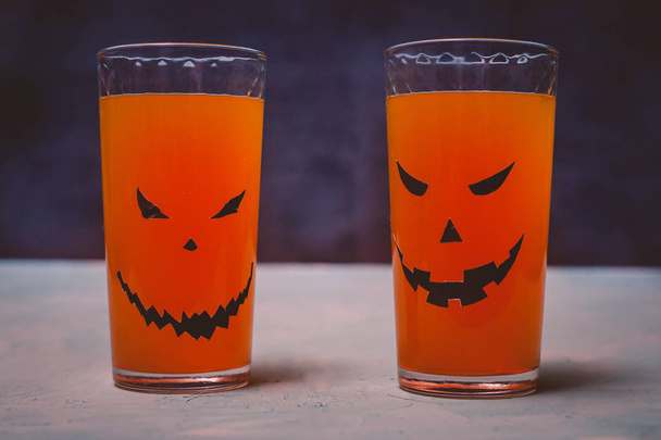 glasses with spooky pumpkins and cookies for Halloween - Photo, Image