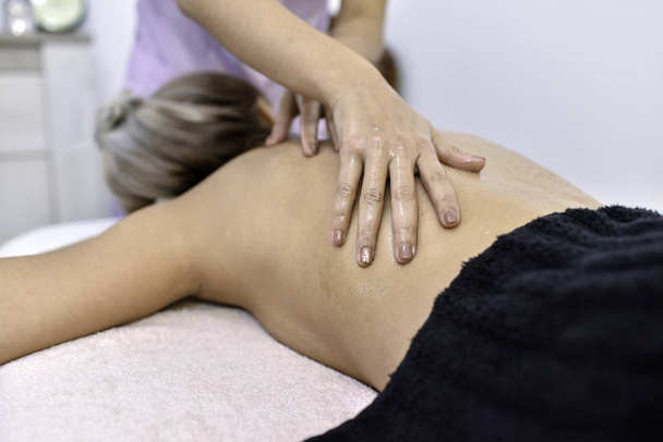relaxing massage in the salon - Photo, Image