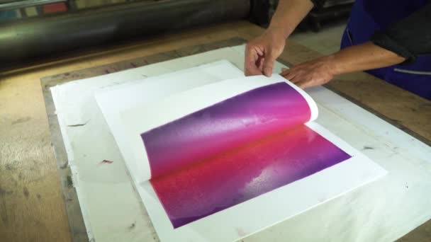 Once the printing process has passed, remove the paper from the mold. - Footage, Video