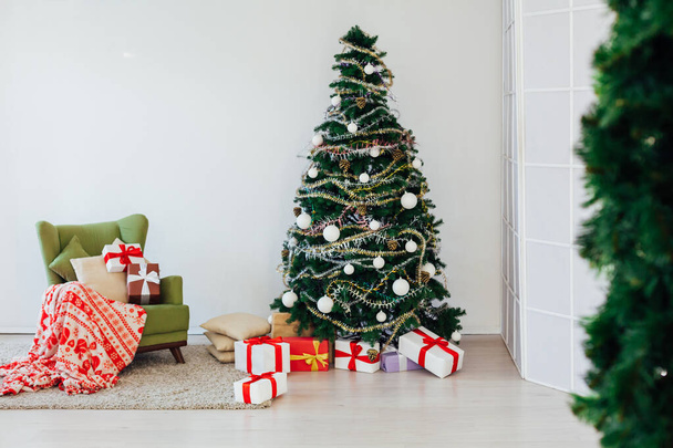 Christmas decoration Christmas tree new year presents holiday interior - 写真・画像